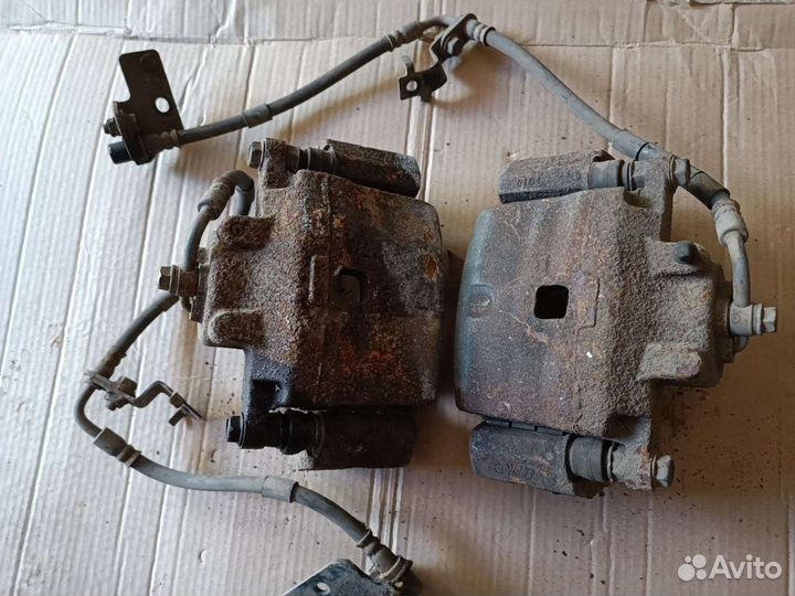 Суппорт тормозной передний Mazda 6 GH