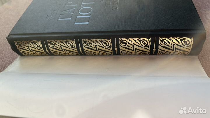 Гарри поттер росмэн в черной обложке