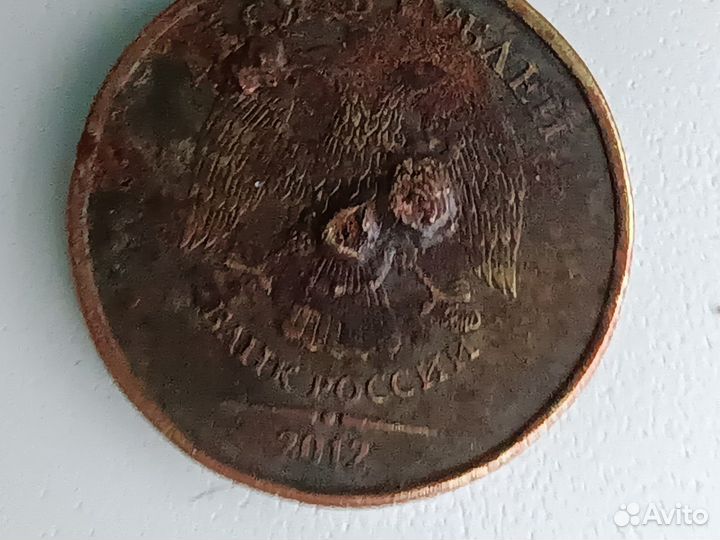 Десятки монеты с интересным браком