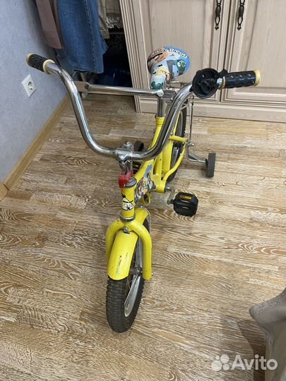 Четырехколесный велосипед