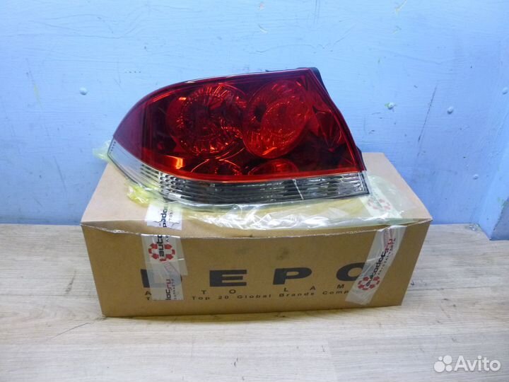Фонарь задний левый mitsubishi lancer 03-07