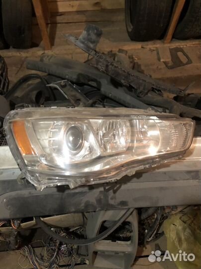 Фара правая лансер Mitsubishi outlander XL