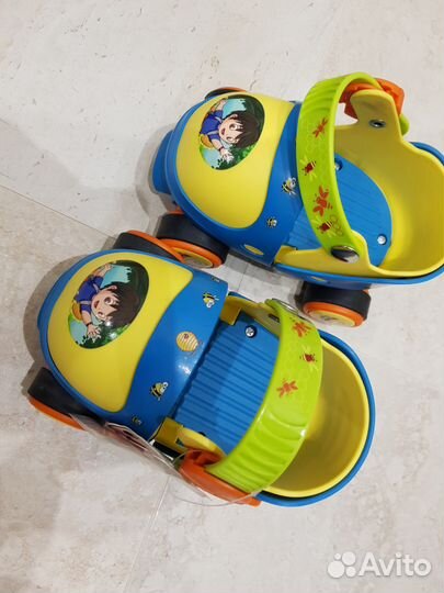 Роликовые коньки новые + защита