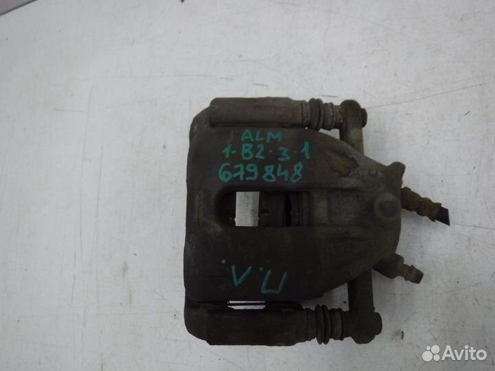 Суппорт тормозной передний левый Nissan Almera 201