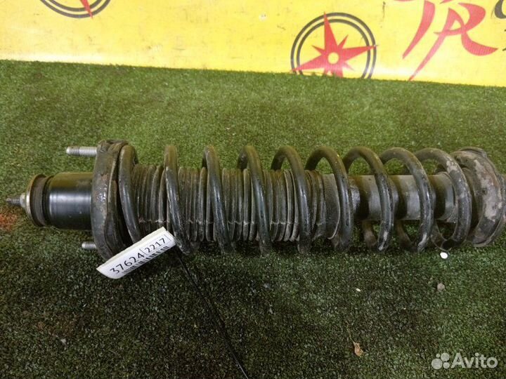 Стойка задняя левая Toyota Vitz NCP15 2NZ-FE 1999