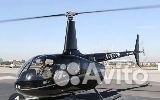Пилот вертолета Robinson R66