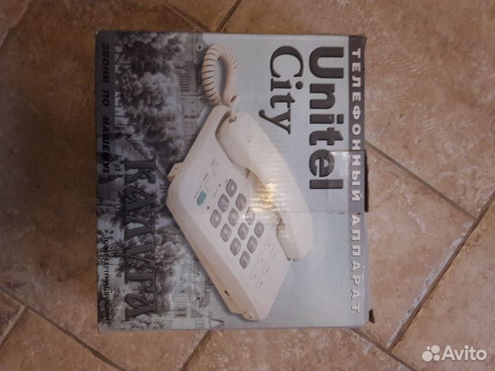 Стационарный проводной телефон