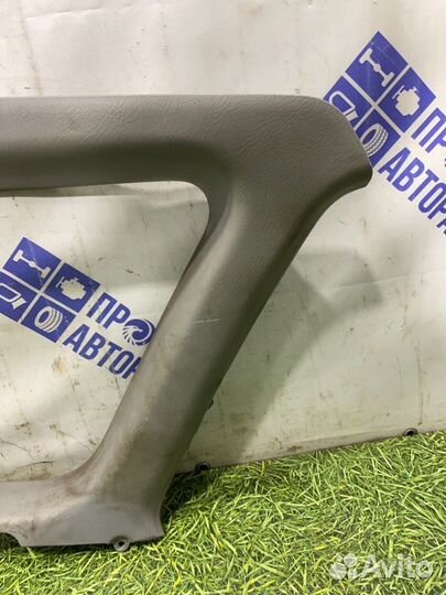 Обшивка багажника задняя левая Toyota Avensis