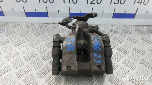 Суппорт тормозной задний правый toyota avensis T27