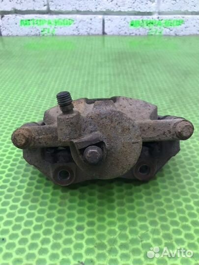 Суппорт тормозной передний левый Volkswagen Polo