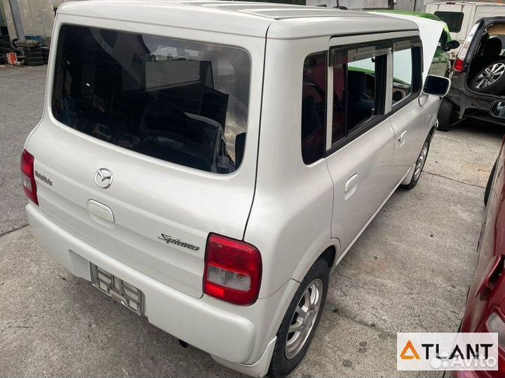 Замок двери задний правый mazda spiano