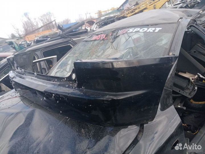 Бампер задний Mazda Demio 1998