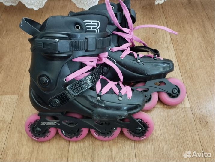 Роликовые коньки