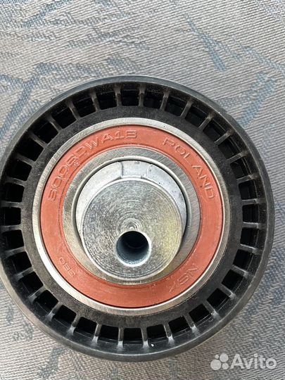 Renault logan натяжной ролик