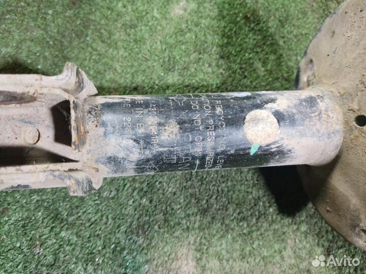 Стойка передняя правая Nissan Almera G15