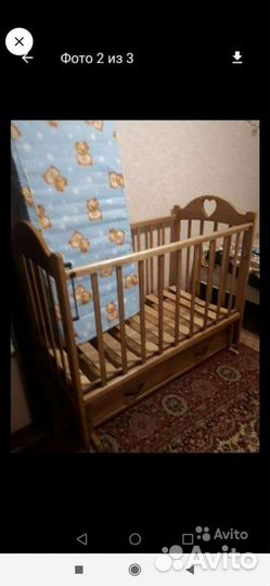 Детская кроватка с маятником и ящиком