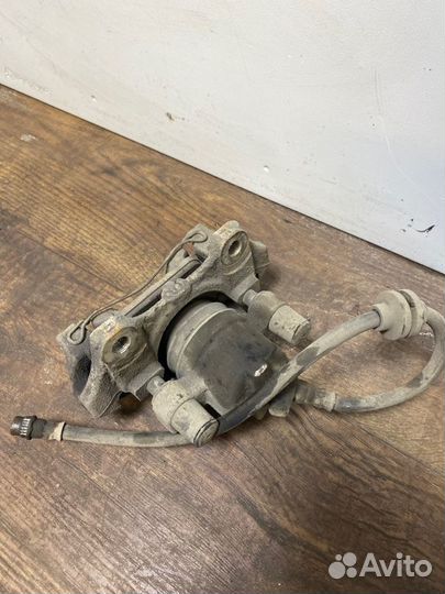 Суппорт тормозной передний левый Renault Logan 2