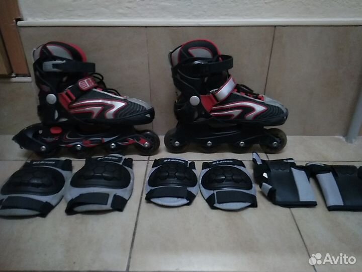 Роликовые коньки б/у 35-38 р-р с защитой