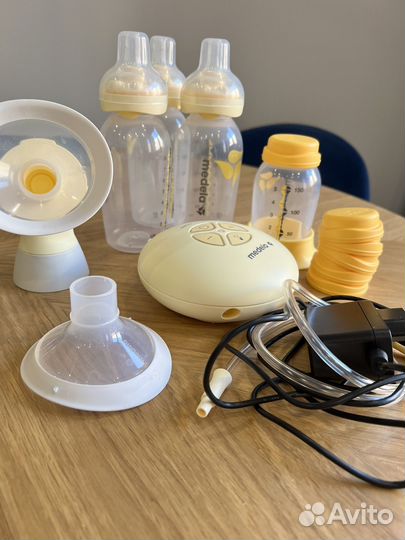 Молокоотсос medela swing электрический