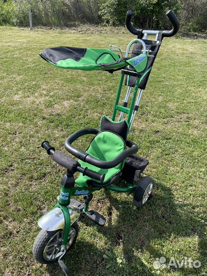 Трехколесный велосипед с ручкой
