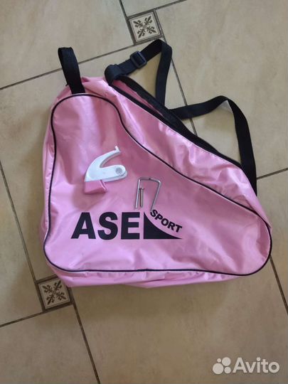 Роликовые коньки