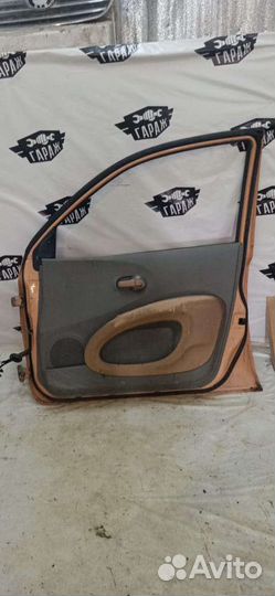 Дверь передняя правая Nissan March k12