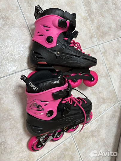 Роликовые коньки