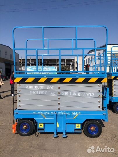 Ножничный подъемник