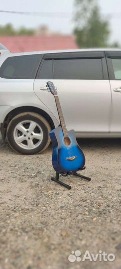 Гитара новая
