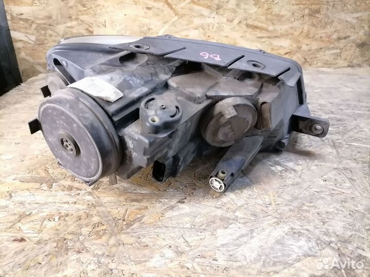 Фара галоген левая Volkswagen Passat B6