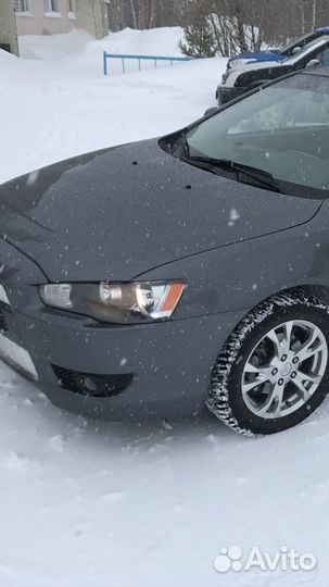 Передний бампер lancer 10