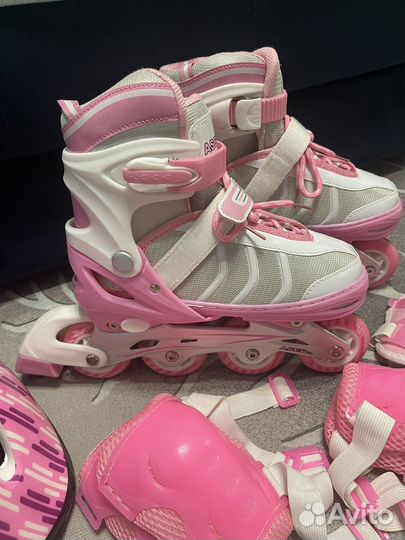 Роликовые коньки