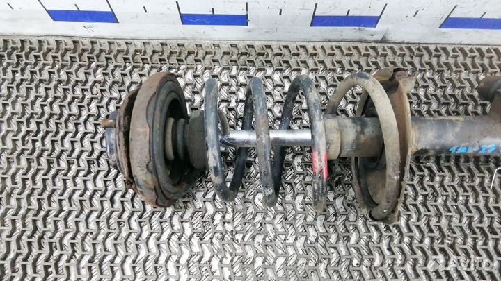 Стойка амортизатора заднего левого Nissan X-Trail