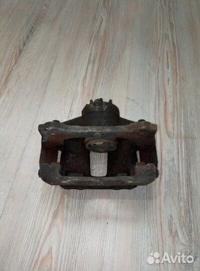 Суппорт тормозной перед Geely emgrand EC7 Лев