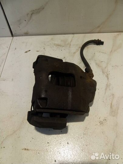 Суппорт тормозной передний правый Ford Fusion