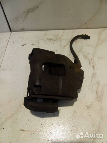 Суппорт тормозной передний правый Ford Fusion