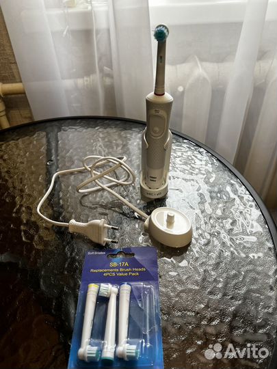 Электрическая зубная щетка braun oral b