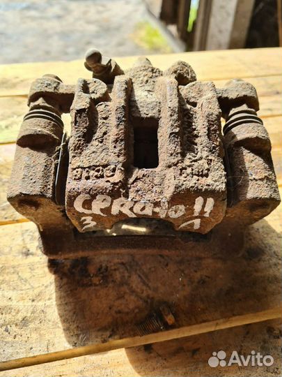 Суппорт задний левый kia cerato 2.2008-2013 г