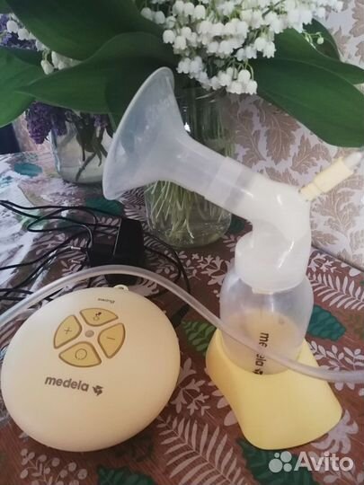 Молокоотсос medela электрический