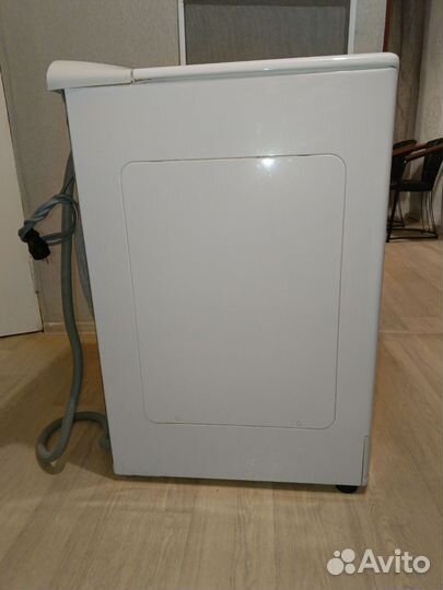 Стиральная машина Канди с вертикальной загрузкой