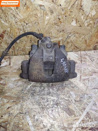 Суппорт тормозной передний правый Mazda 3 BL