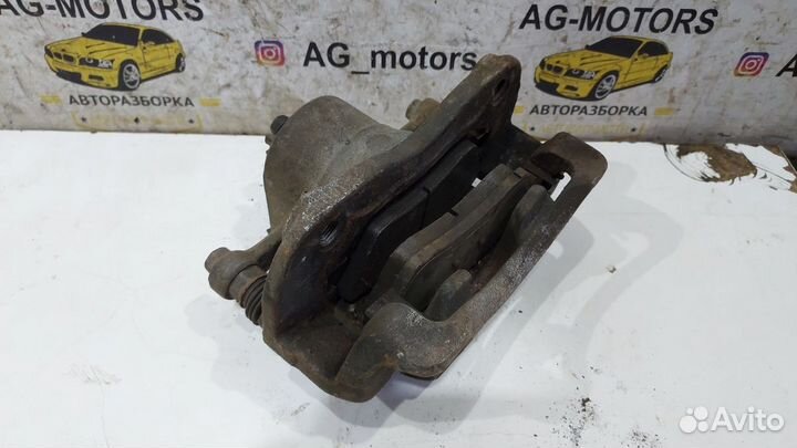 Суппорт тормозной передний левый Solaris I