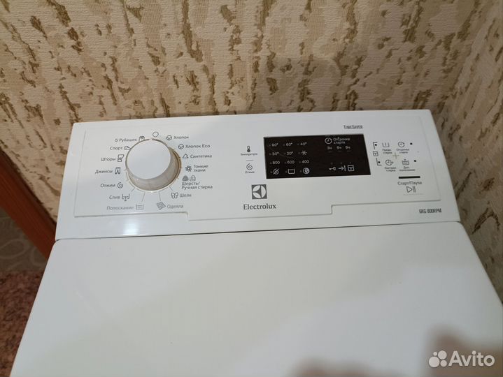 Стиральная машина с вертикальной загрузкой