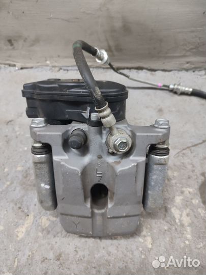 Суппорт задний левый