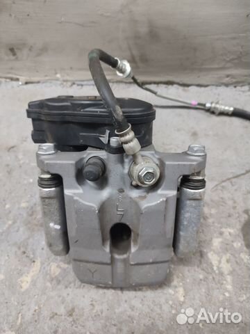 Суппорт задний левый