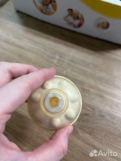 Молокоотсос medela электрический