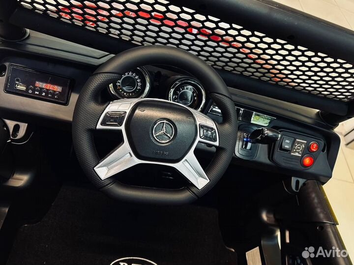 Детский электромобиль двух местный Унимог