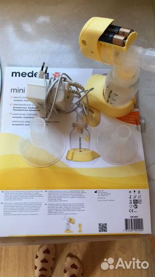 Молокоотсос medela электрический