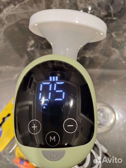 Молокоотсос электрический