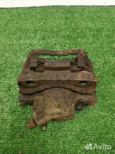 Суппорт тормозной передний правый Renault Logan